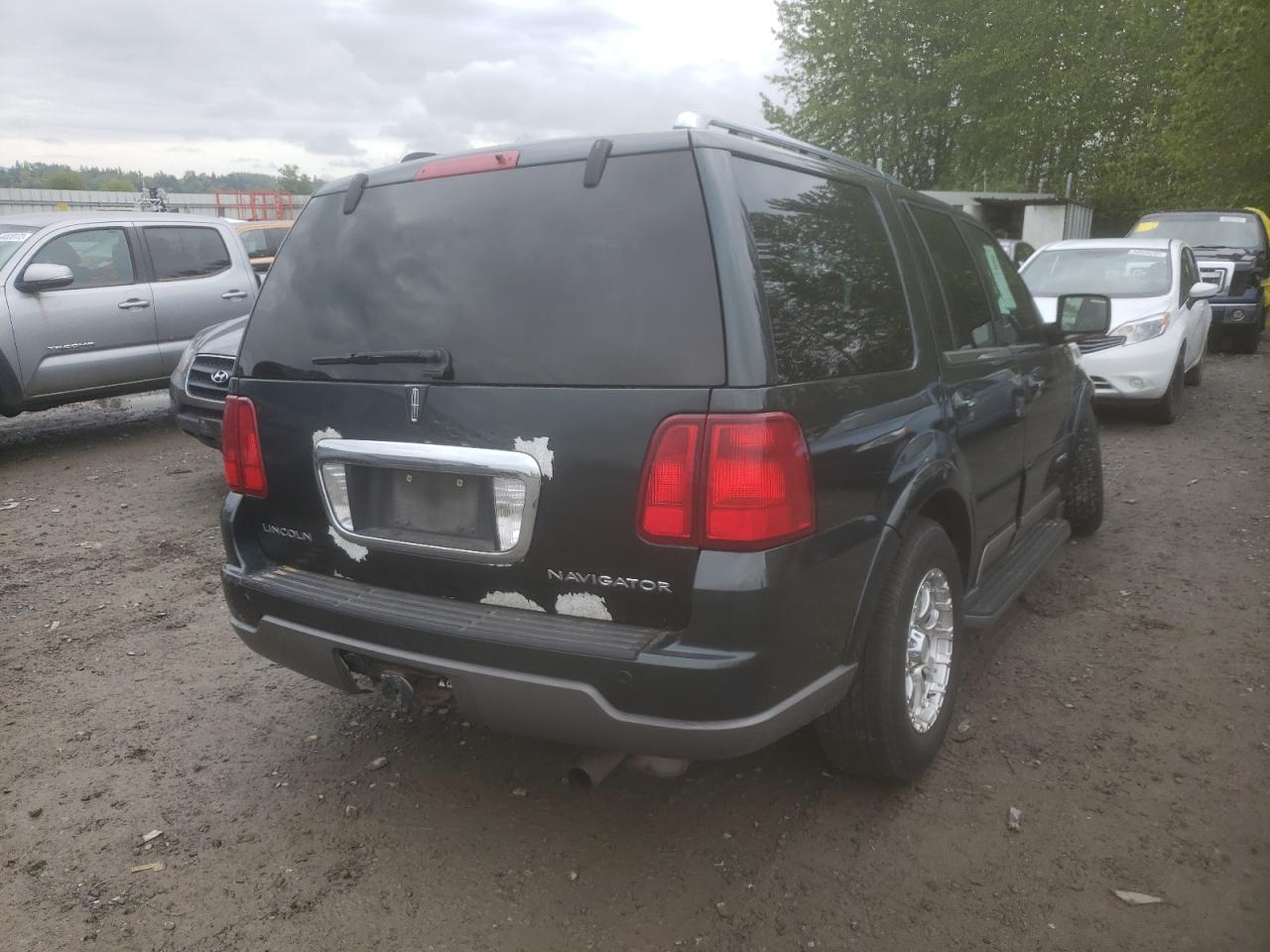 Photo 4 from auction – 2003 LINCOLN NAVIGATOR with VIN 5LMFU28R23LJ02909
