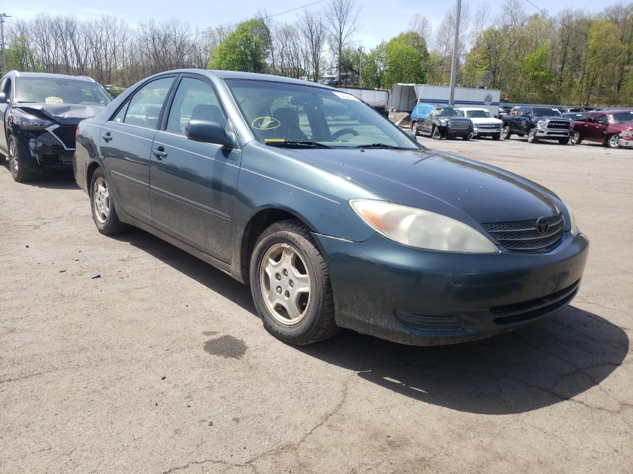 TOYOTA CAMRY LE 2002 with VIN 4T1BF32K92U519045 - Photo from auction