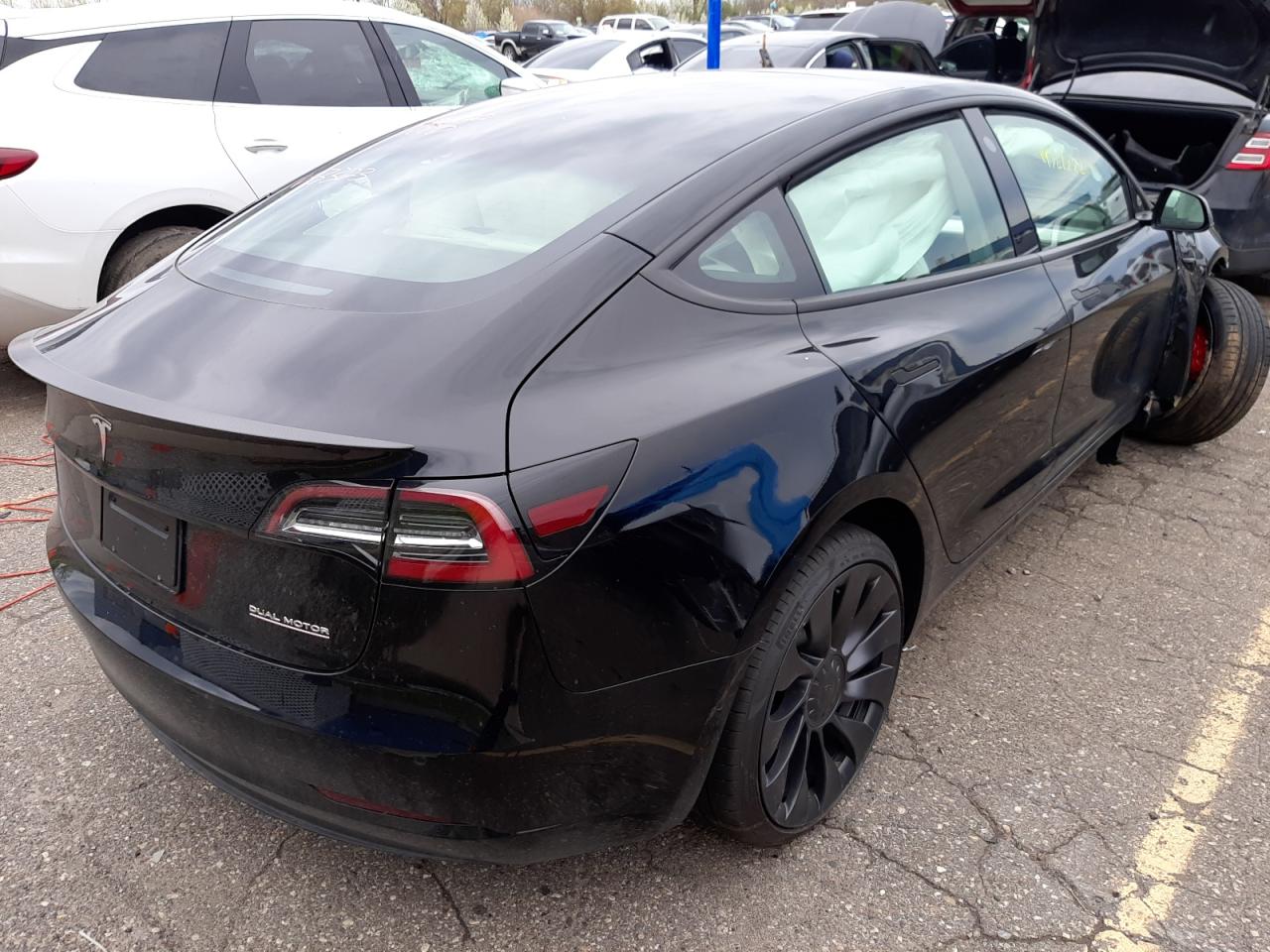 Photo 4 from auction – 2022 TESLA MODEL 3 with VIN 5YJ3E1EC7NF203323