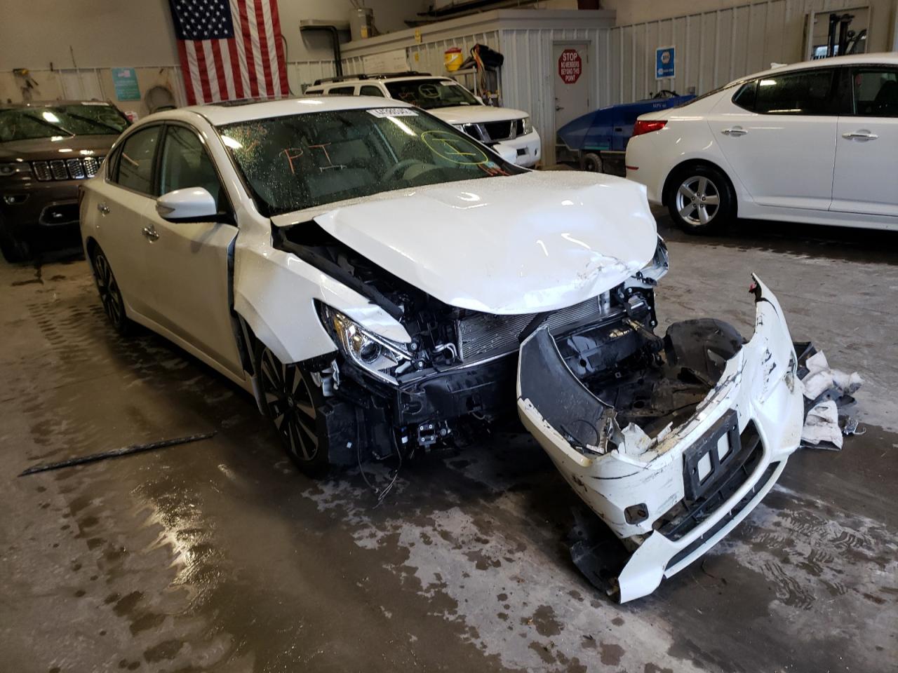 NISSAN ALTIMA 2.5 2018 with VIN 1N4AL3AP6JC136695 - Photo from auction