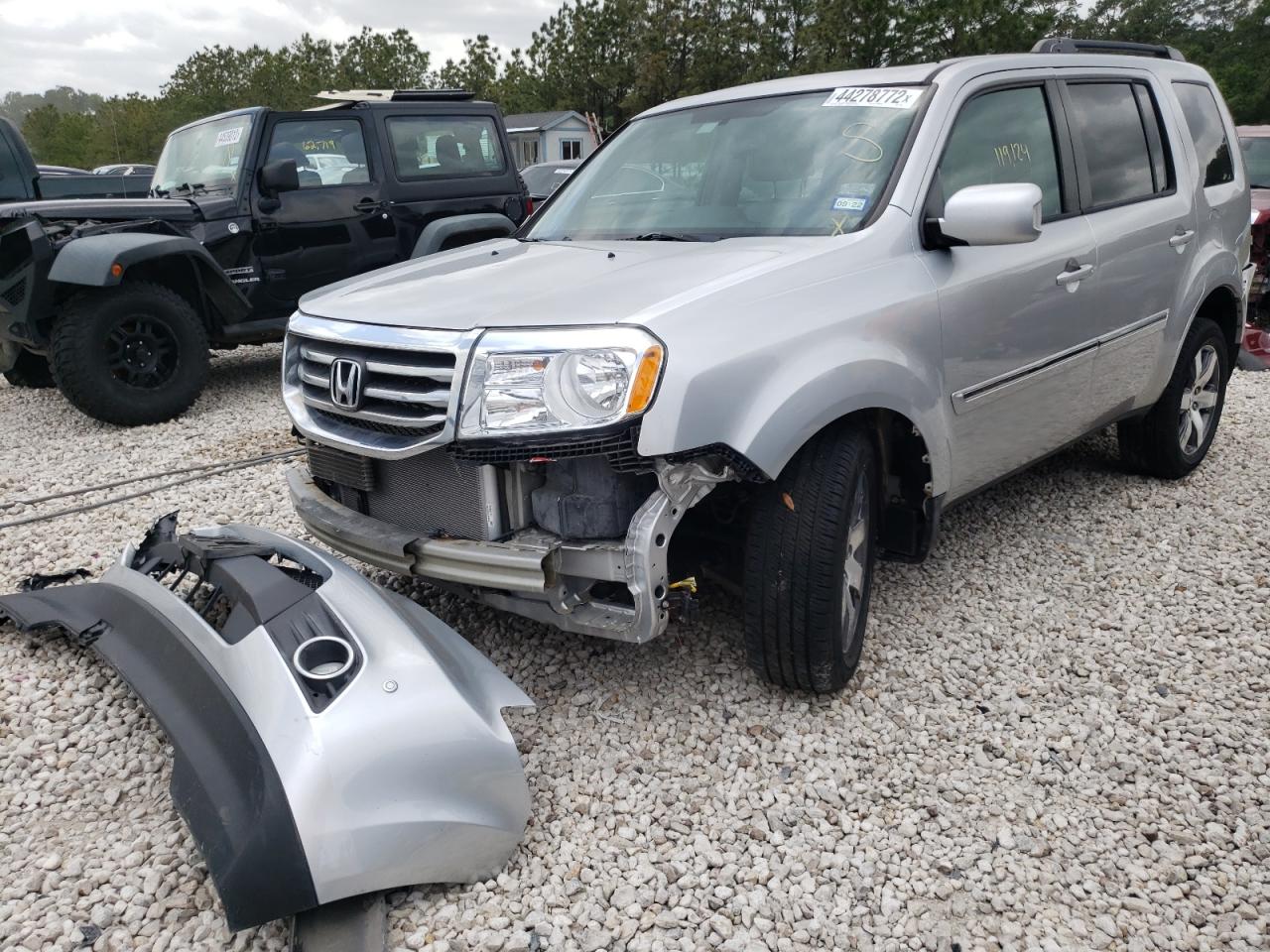 Photo 2 from auction – 2013 HONDA PILOT TOUR with VIN 5FNYF4H90DB073842