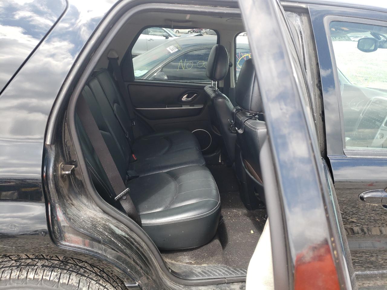 Photo 6 from auction – 2006 MERCURY MARINER with VIN 4M2YU57196DJ05599