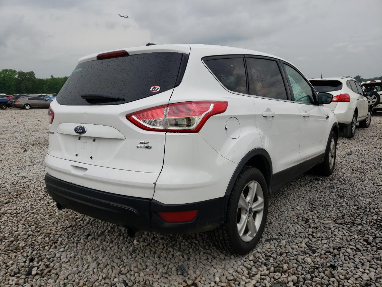 Photo 4 from auction – 2013 FORD ESCAPE SE with VIN 1FMCU9GX8DUD41827