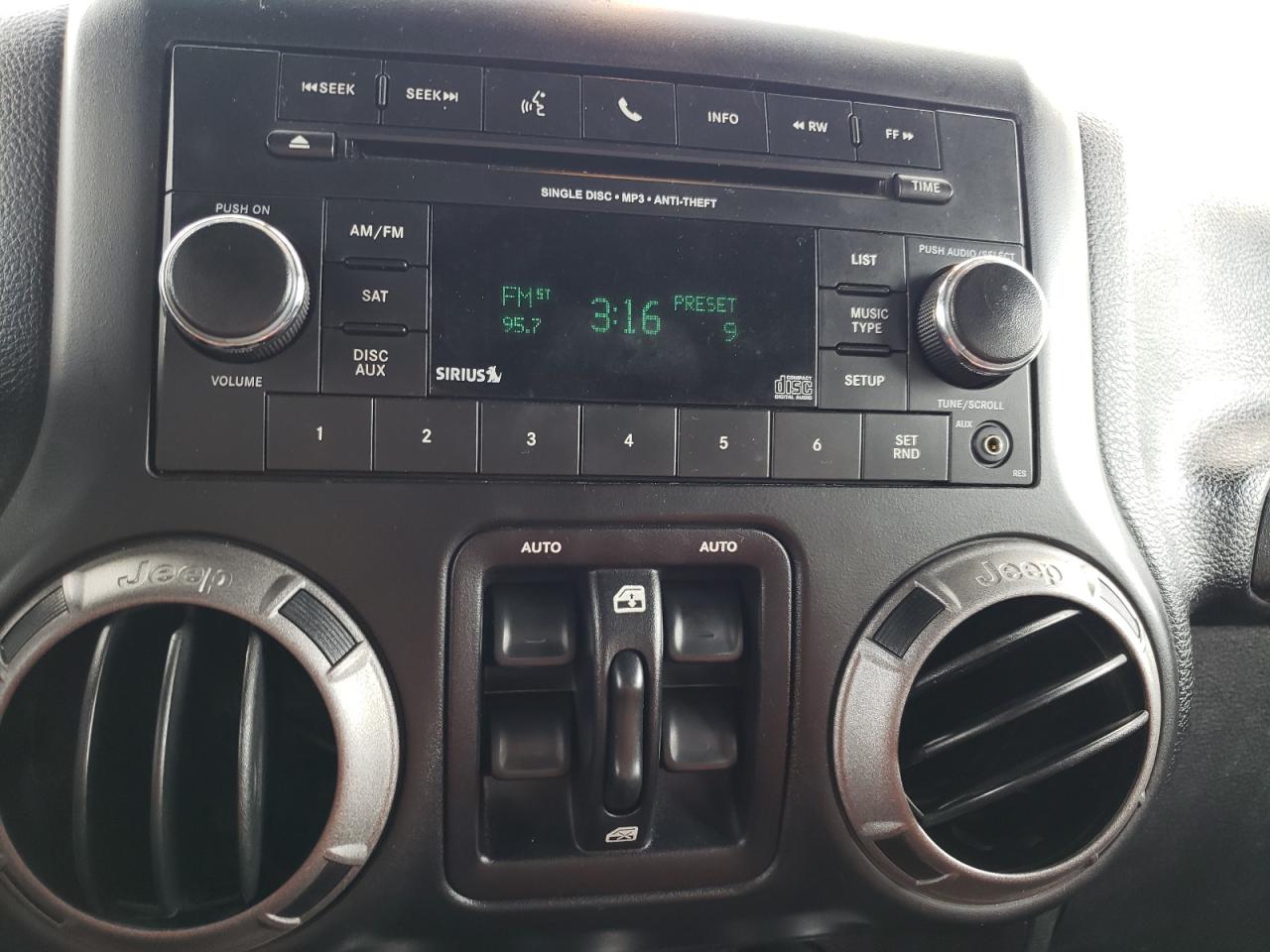 Photo 9 from auction – 2015 JEEP WRANGLER U with VIN 1C4BJWDG6FL759288
