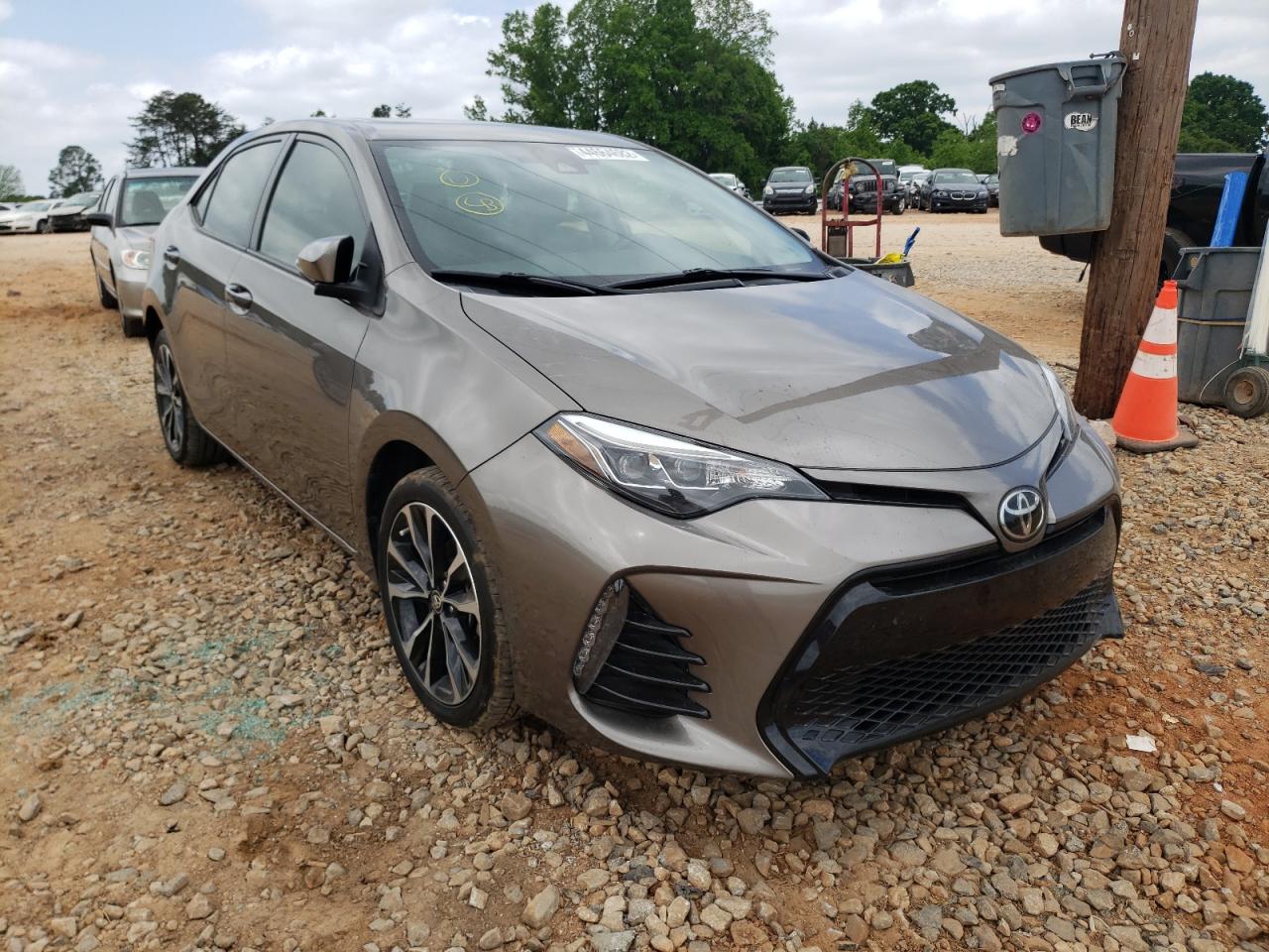 TOYOTA COROLLA L 2017 with VIN 5YFBURHE7HP613042 - Photo from auction