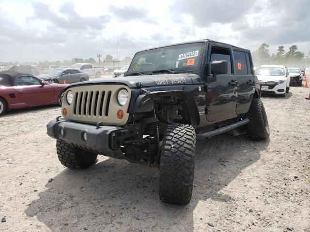 Photo 2 from auction – 2011 JEEP WRANGLER U with VIN 1J4HA3H13BL504780