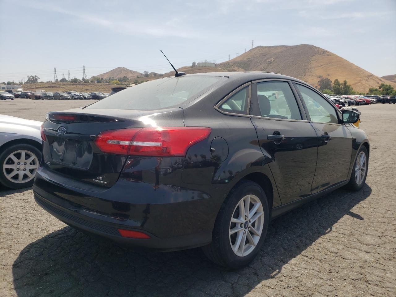 Photo 4 from auction – 2015 FORD FOCUS SE with VIN 1FADP3F28FL312510