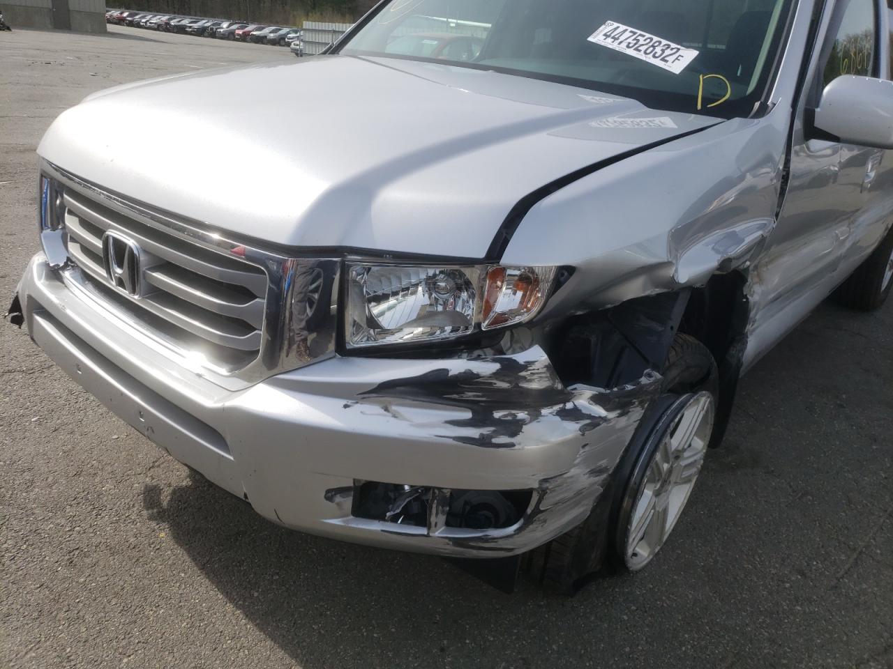Photo 9 from auction – 2012 HONDA RIDGELINE with VIN 5FPYK1F51CB451943