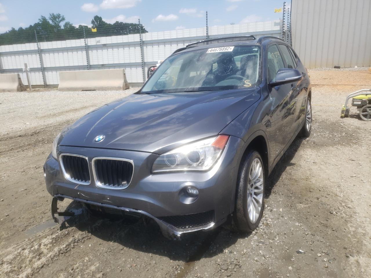 Photo 2 from auction – 2015 BMW X1 SDRIVE2 with VIN WBAVM1C53FV498677