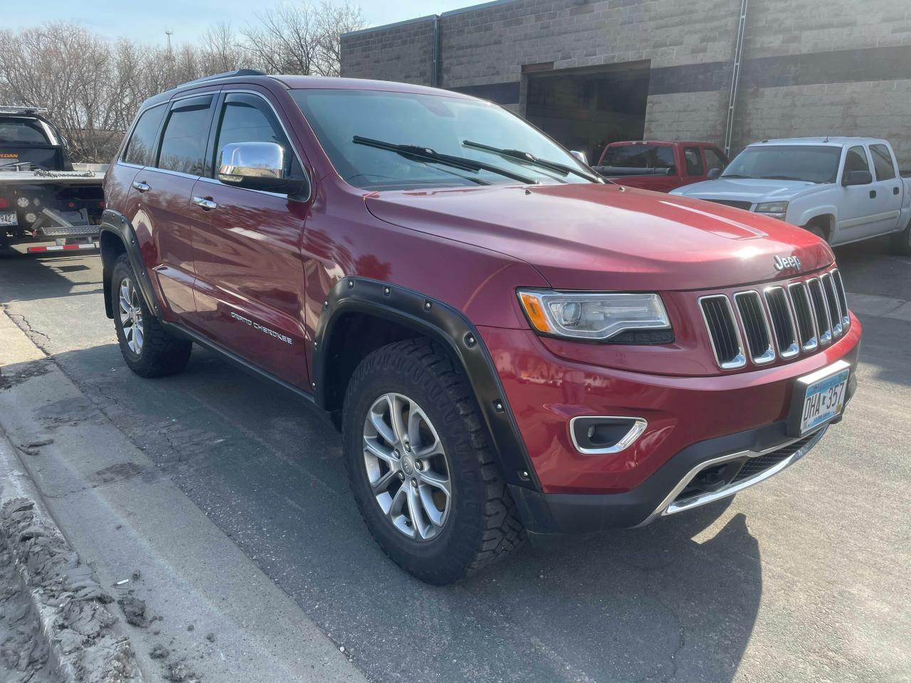 JEEP GRAND CHER 2014 with VIN 1C4RJFBM3EC380593 - Photo from auction