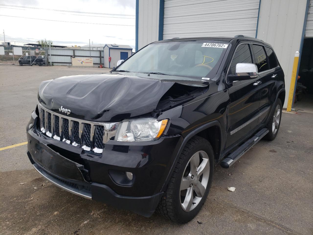 Photo 2 from auction – 2011 JEEP GRAND CHER with VIN 1J4RS6GT9BC658867