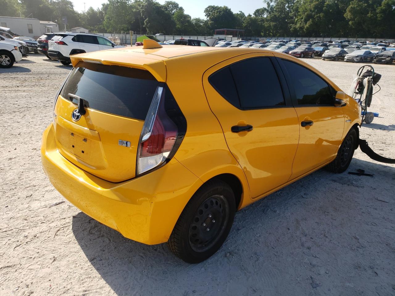 Photo 4 from auction – 2015 TOYOTA PRIUS C with VIN JTDKDTB34F1094747