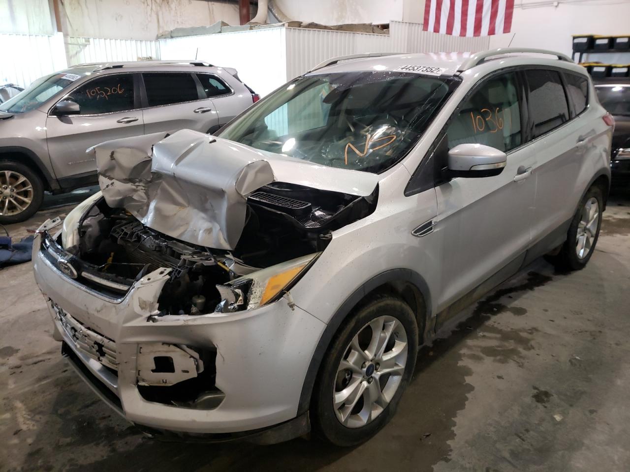 Photo 2 from auction – 2016 FORD ESCAPE TIT with VIN 1FMCU0J90GUC14113
