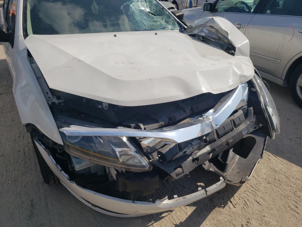 Photo 9 from auction – 2011 FORD FUSION S with VIN 3FAHP0GA6BR287396