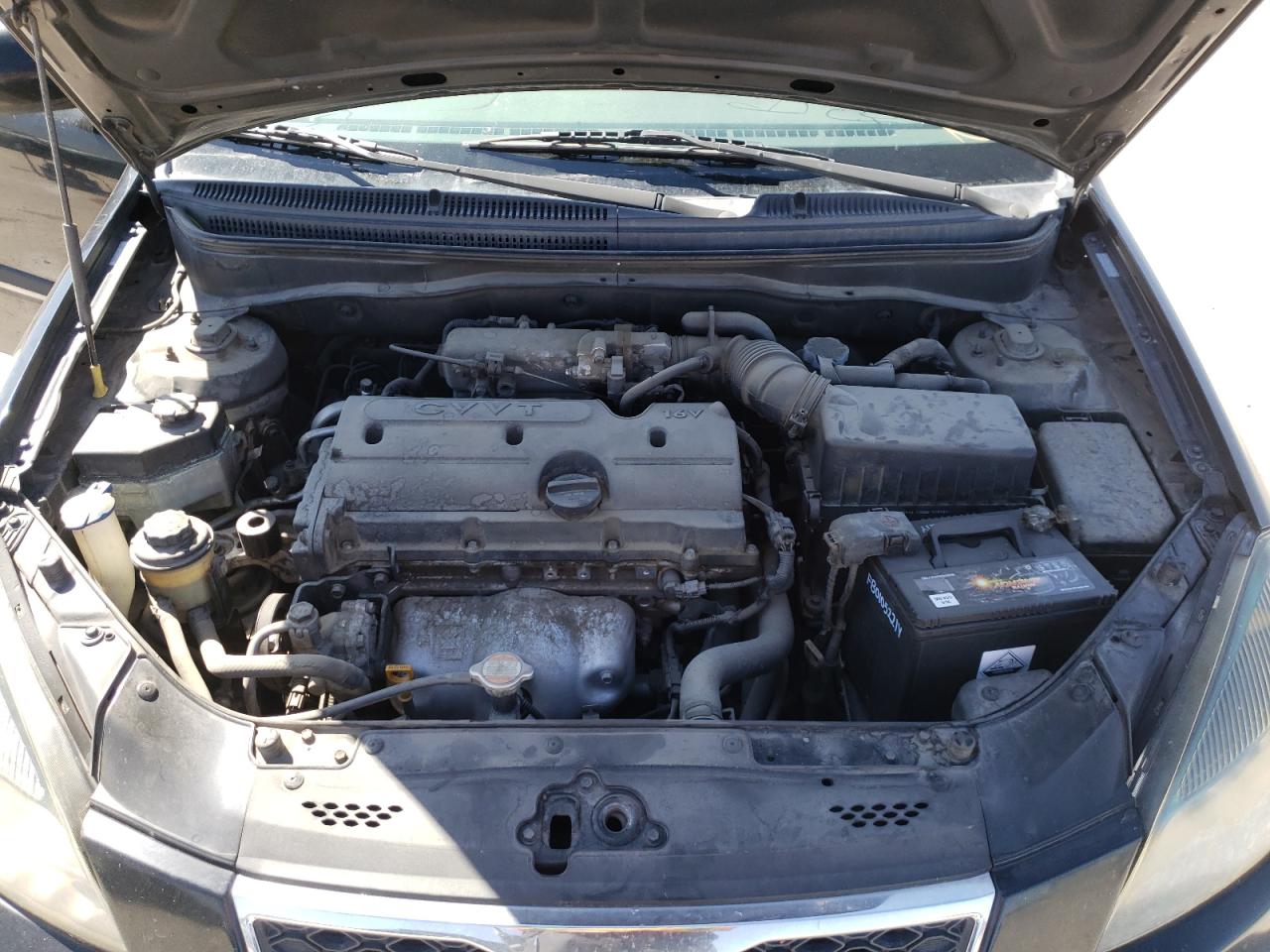 Photo 7 from auction – 2010 KIA RIO LX with VIN KNADH4A34A6662671