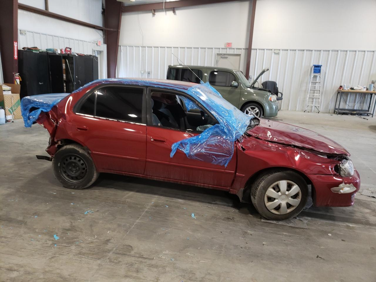 Photo 9 from auction – 2002 TOYOTA COROLLA with VIN 2T1BR12E12C524408