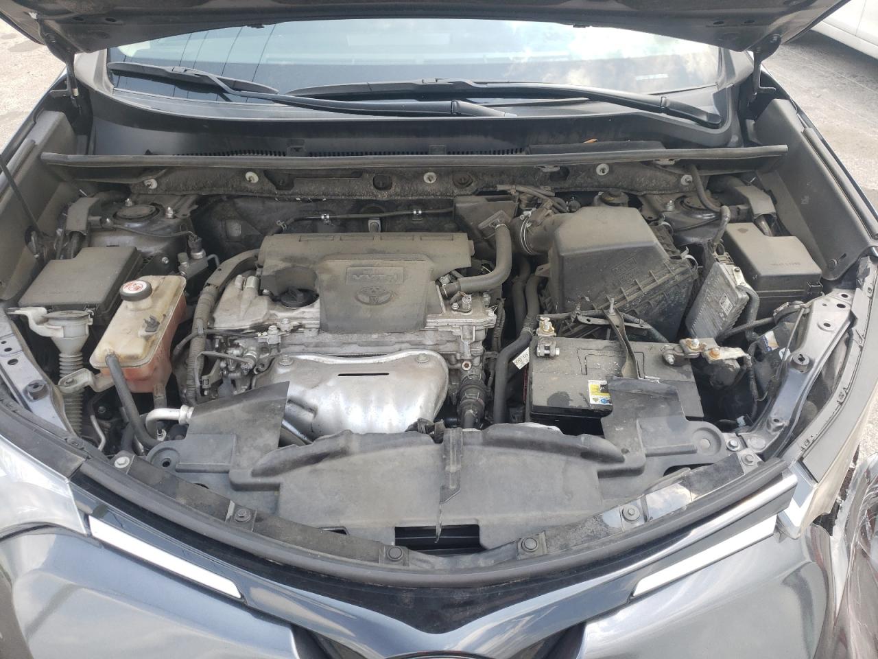 Photo 7 from auction – 2018 TOYOTA RAV4 with VIN JTMZFREV5JJ156402