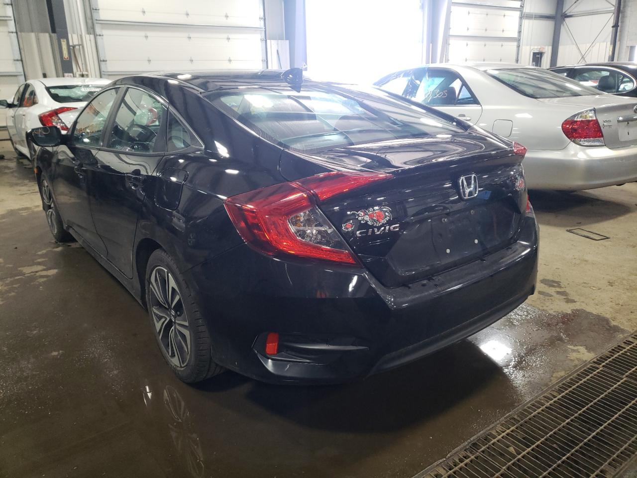 Photo 3 from auction – 2016 HONDA CIVIC EXL with VIN 19XFC1F77GE020761