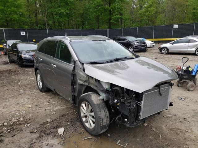 KIA SORENTO LX 2016 with VIN 5XYPGDA39GG146749 - Photo from auction