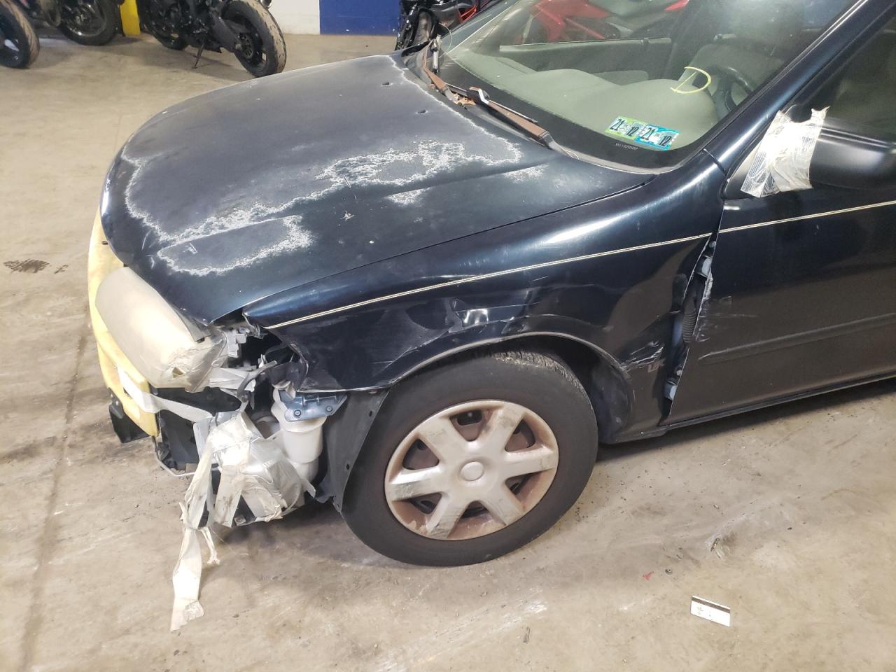 Photo 9 from auction – 1997 MAZDA PROTEGE DX with VIN JM1BC1417V0169982