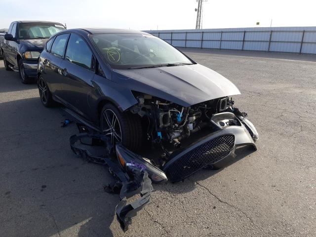 FORD FOCUS ST 2018 with VIN 1FADP3L92JL233554 - Photo from auction