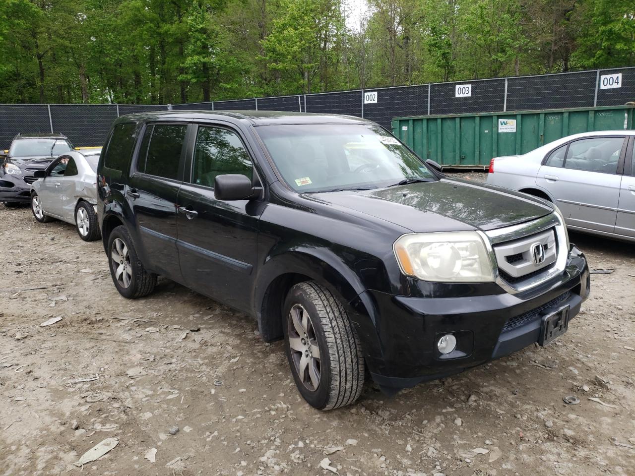 HONDA PILOT LX 2011 with VIN 5FNYF4H26BB046077 - Photo from auction