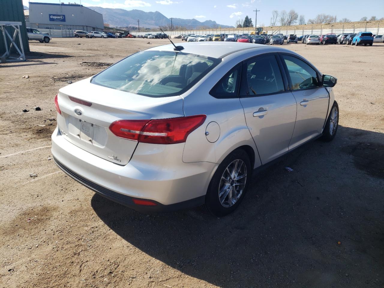 Photo 4 from auction – 2016 FORD FOCUS SE with VIN 1FADP3F26GL253619