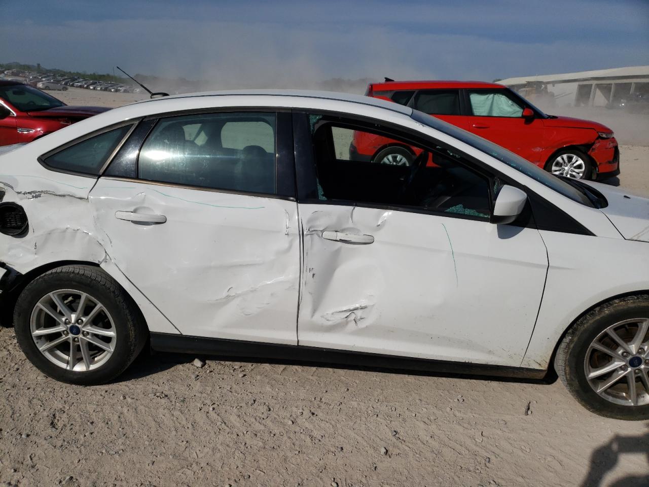 Photo 9 from auction – 2018 FORD FOCUS SE with VIN 1FADP3F28JL298892
