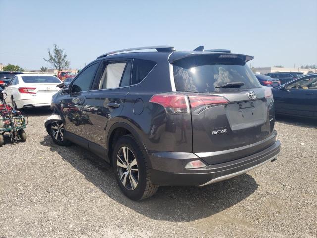 Photo 3 from auction – 2017 TOYOTA RAV4 XLE with VIN JTMWFREV8HJ136268
