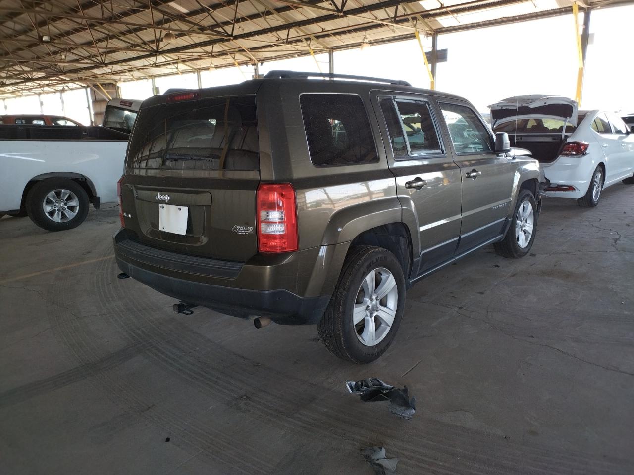 Photo 4 from auction – 2015 JEEP PATRIOT SP with VIN 1C4NJRBB0FD290201