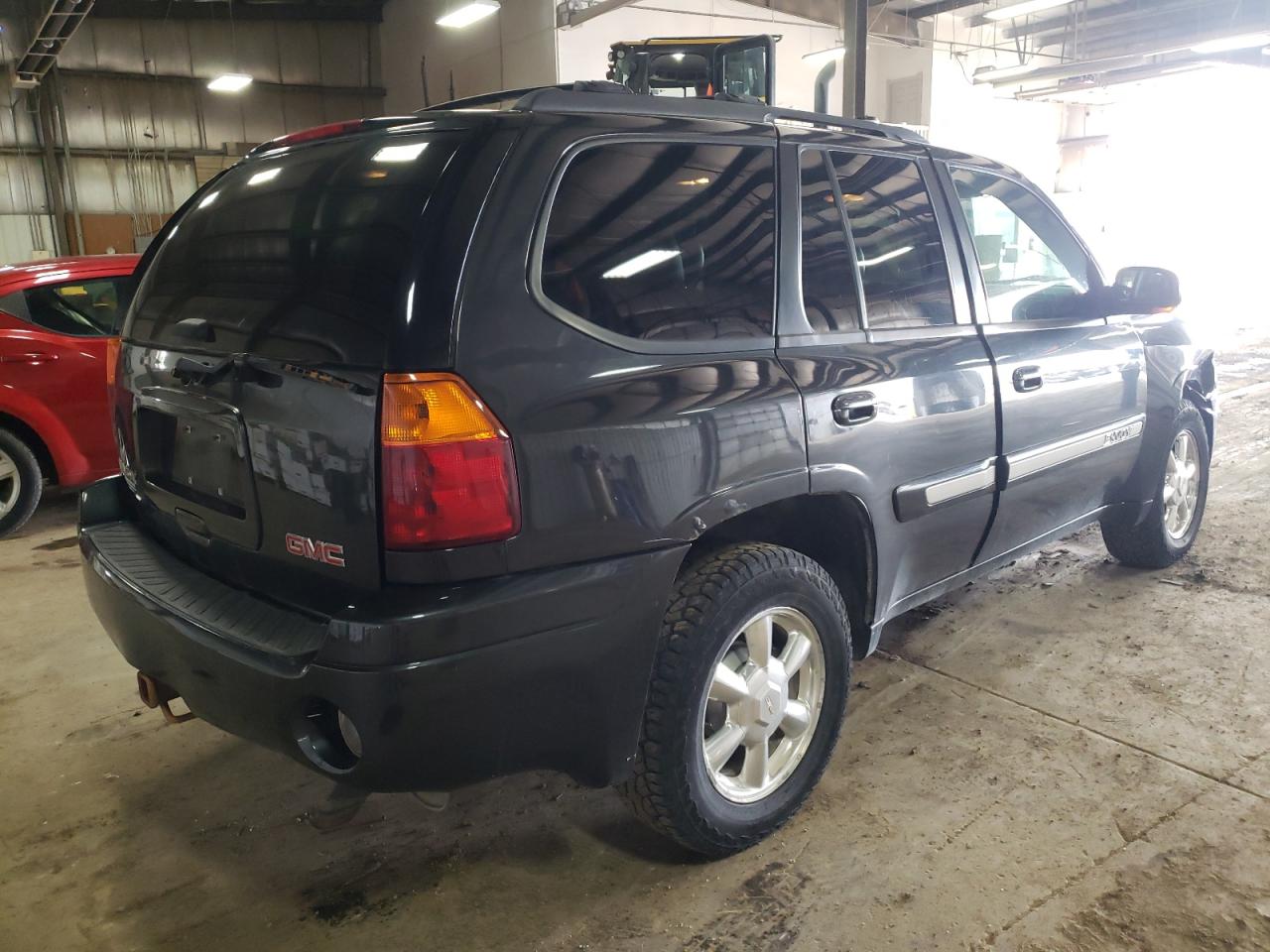 Photo 4 from auction – 2005 GMC ENVOY with VIN 1GKDT13S352252451