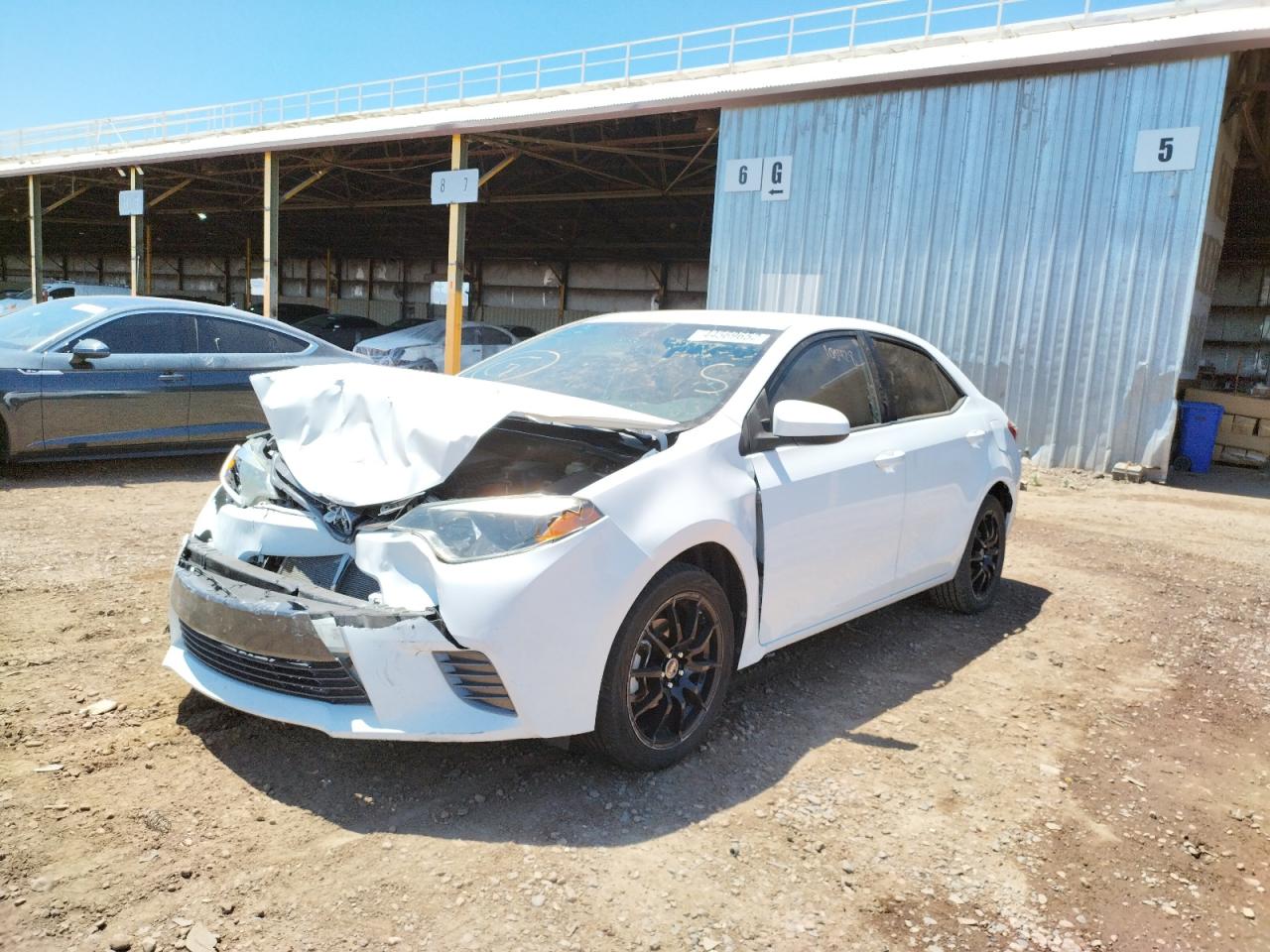 Photo 2 from auction – 2015 TOYOTA COROLLA L with VIN 5YFBURHE1FP244983