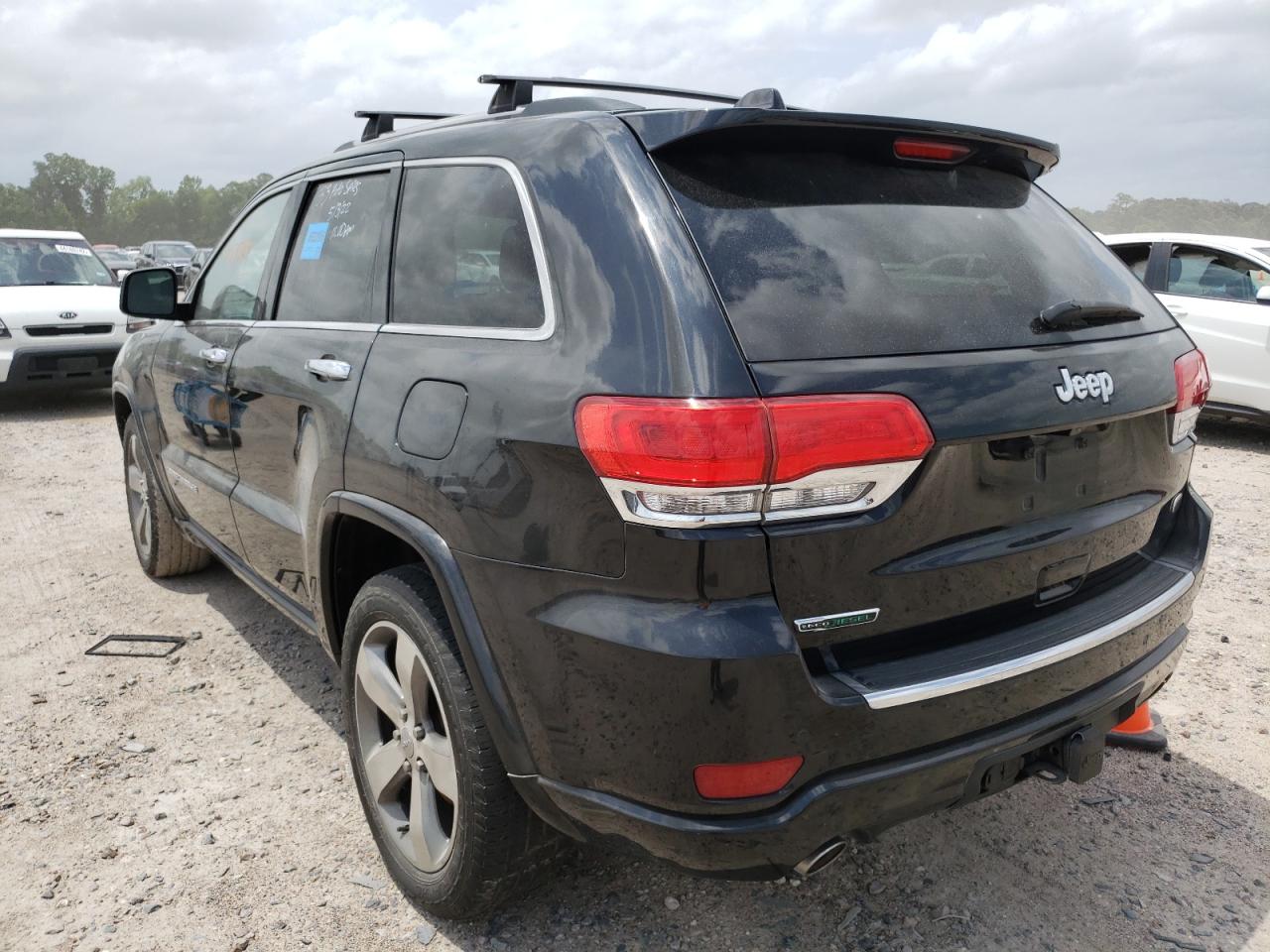 Photo 3 from auction – 2014 JEEP GRAND CHER with VIN 1C4RJECMXEC437963