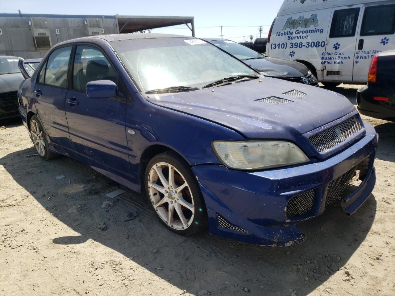 MITSUBISHI LANCER OZ 2003 with VIN JA3AJ86EX3U003244 - Photo from auction