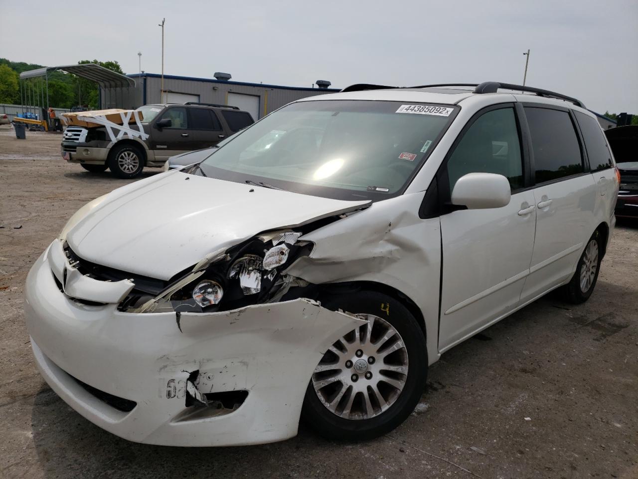 Photo 2 from auction – 2010 TOYOTA SIENNA XLE with VIN 5TDYK4CC9AS299299