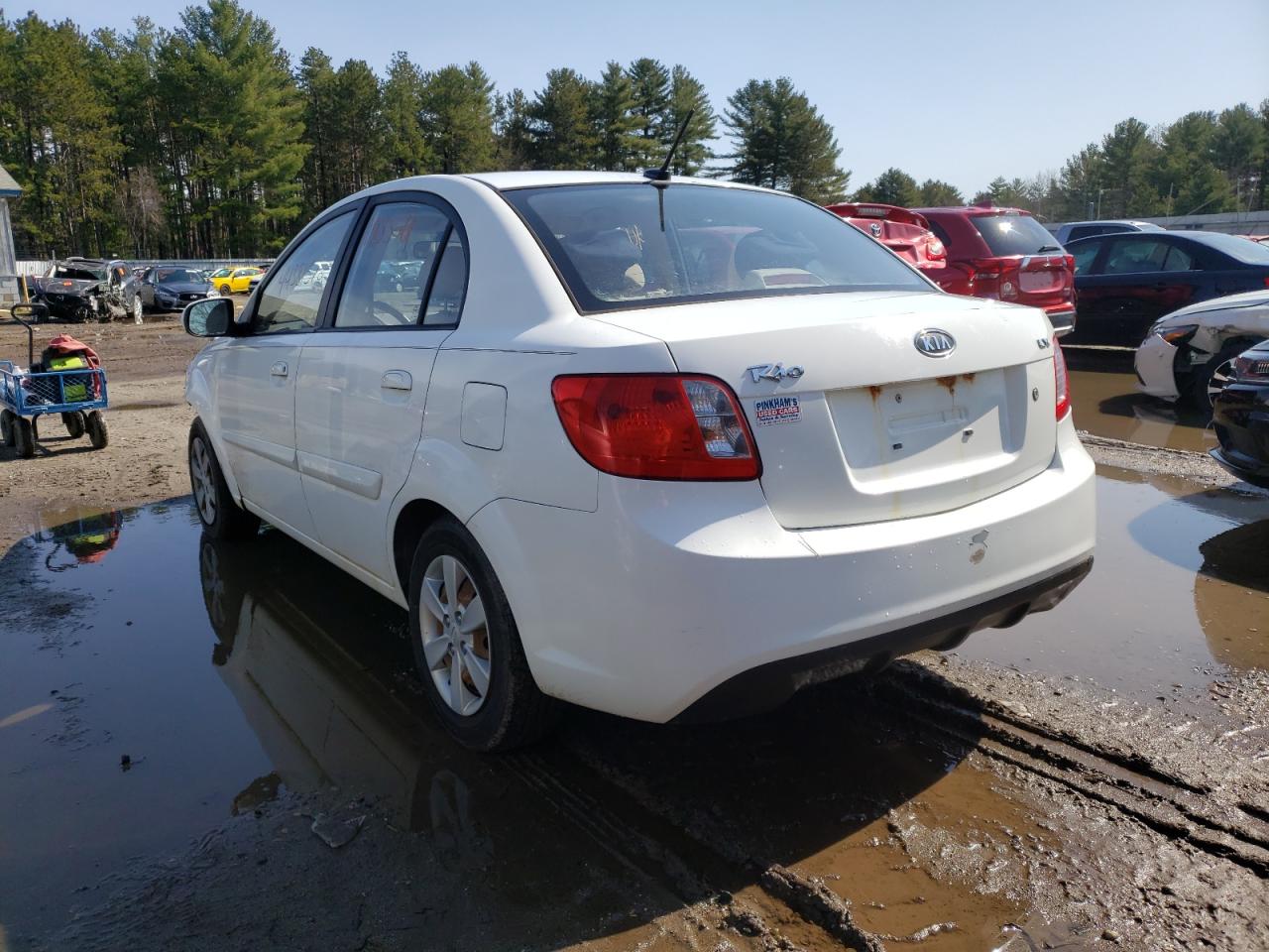 Photo 3 from auction – 2011 KIA RIO BASE with VIN KNADH4A31B6736338