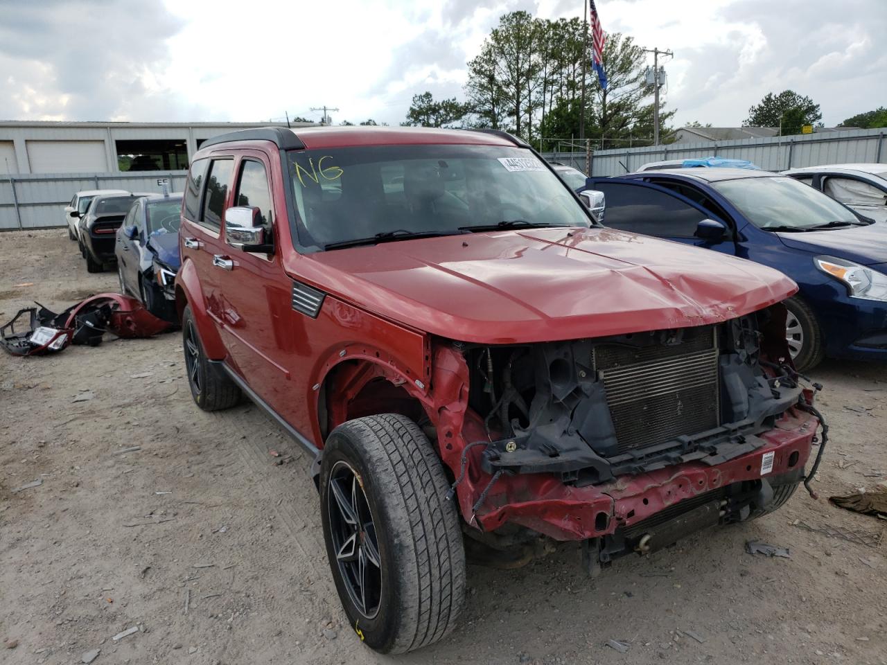 DODGE NITRO HEAT 2011 with VIN 1D4PT4GX6BW500358 - Photo from auction