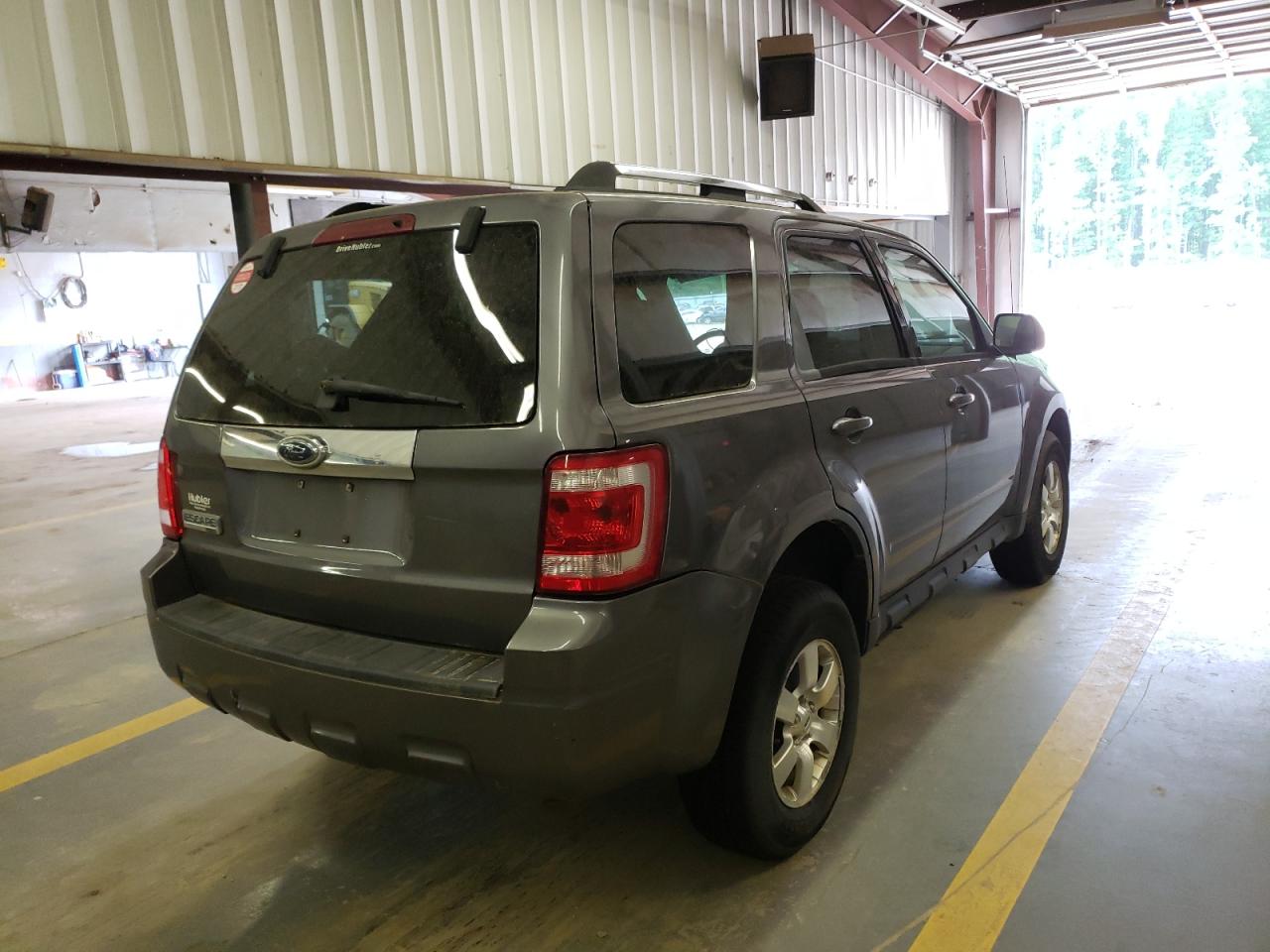Photo 4 from auction – 2009 FORD ESCAPE LIM with VIN 1FMCU047X9KA19502