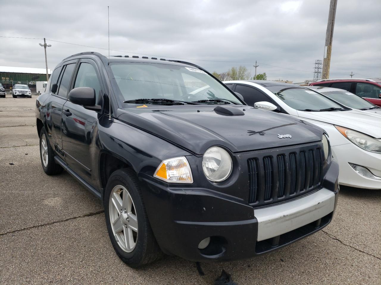 JEEP COMPASS SP 2009 with VIN 1J4FT47BX9D122669 - Photo from auction