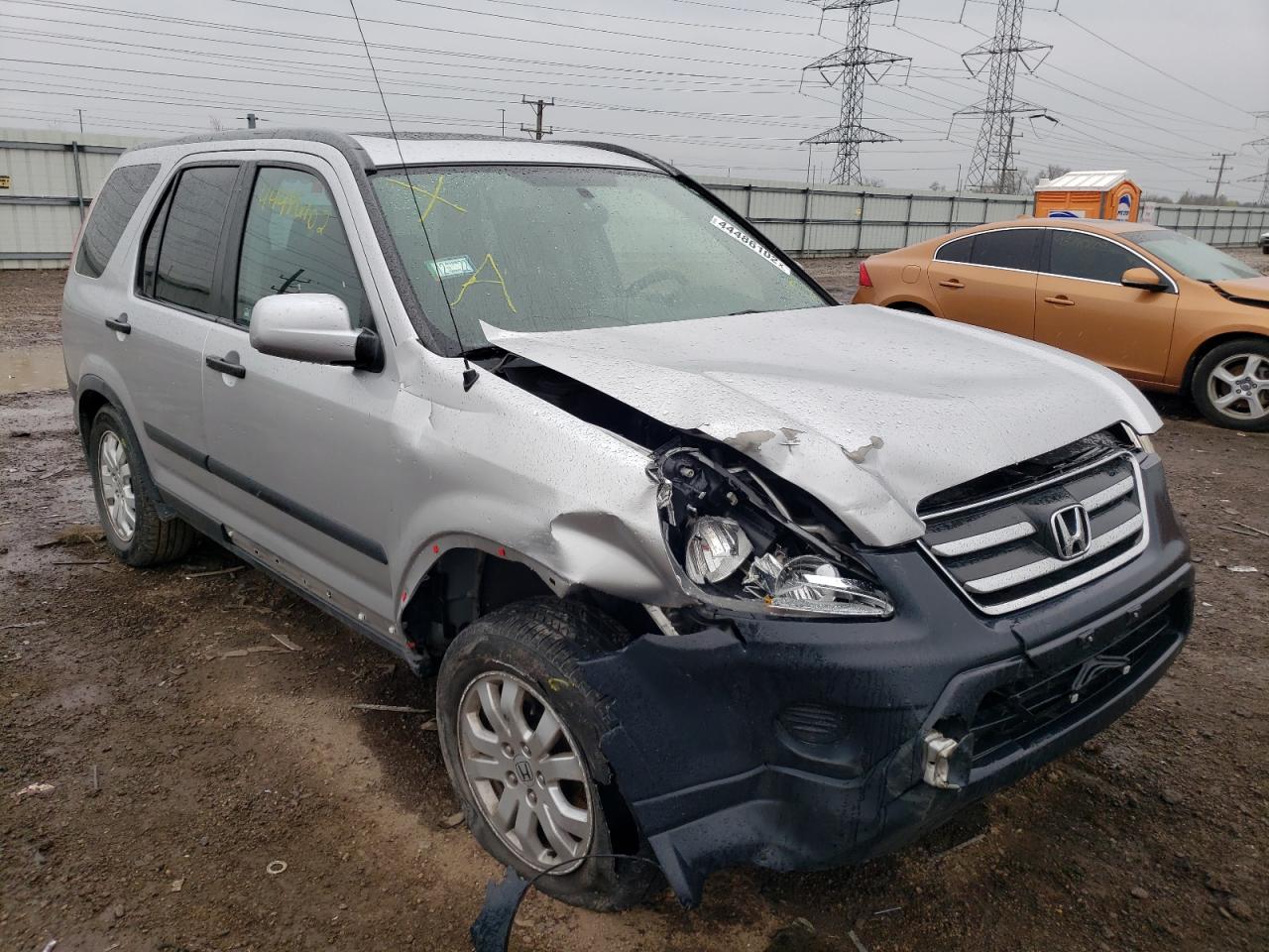HONDA CR-V EX 2006 with VIN JHLRD68816C025301 - Photo from auction