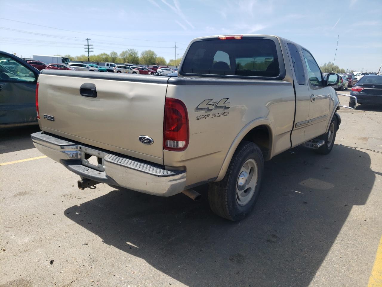 Photo 4 from auction – 2000 FORD F150 with VIN 1FTRX18W5YNB41890