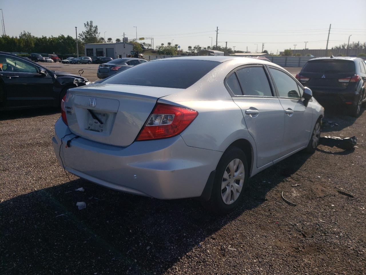 Photo 4 from auction – 2012 HONDA CIVIC LX with VIN 19XFB2F50CE046135