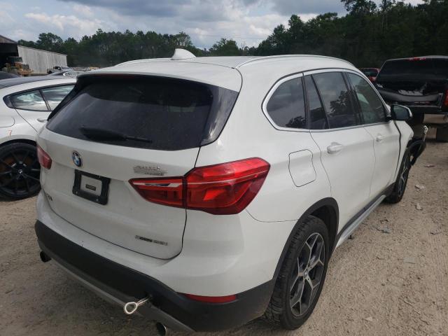 Photo 4 from auction – 2018 BMW X1 XDRIVE2 with VIN WBXHT3C35J5L29561