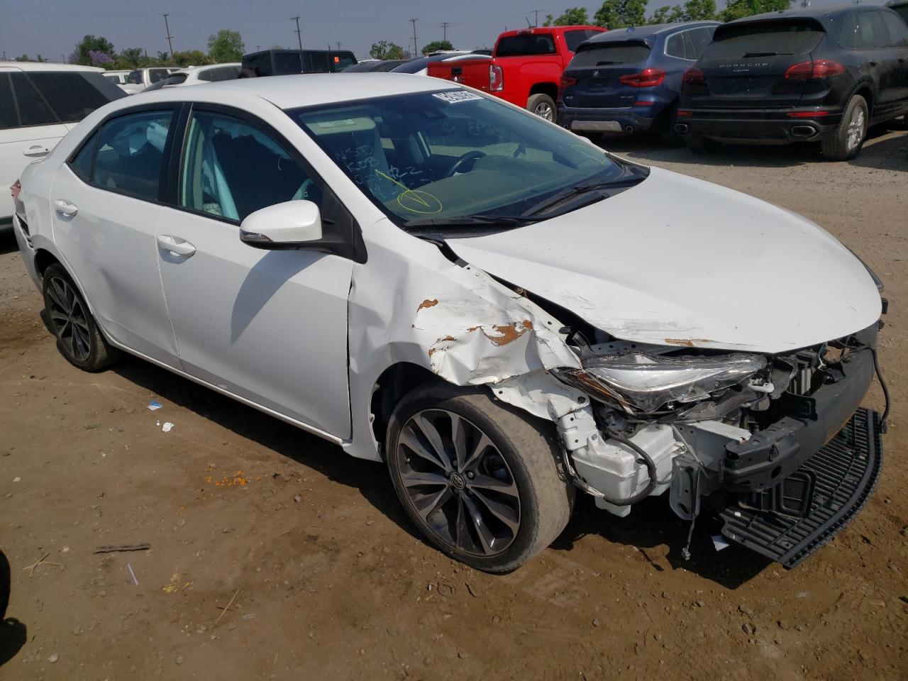 TOYOTA COROLLA L 2019 with VIN 5YFBURHE5KP890862 - Photo from auction