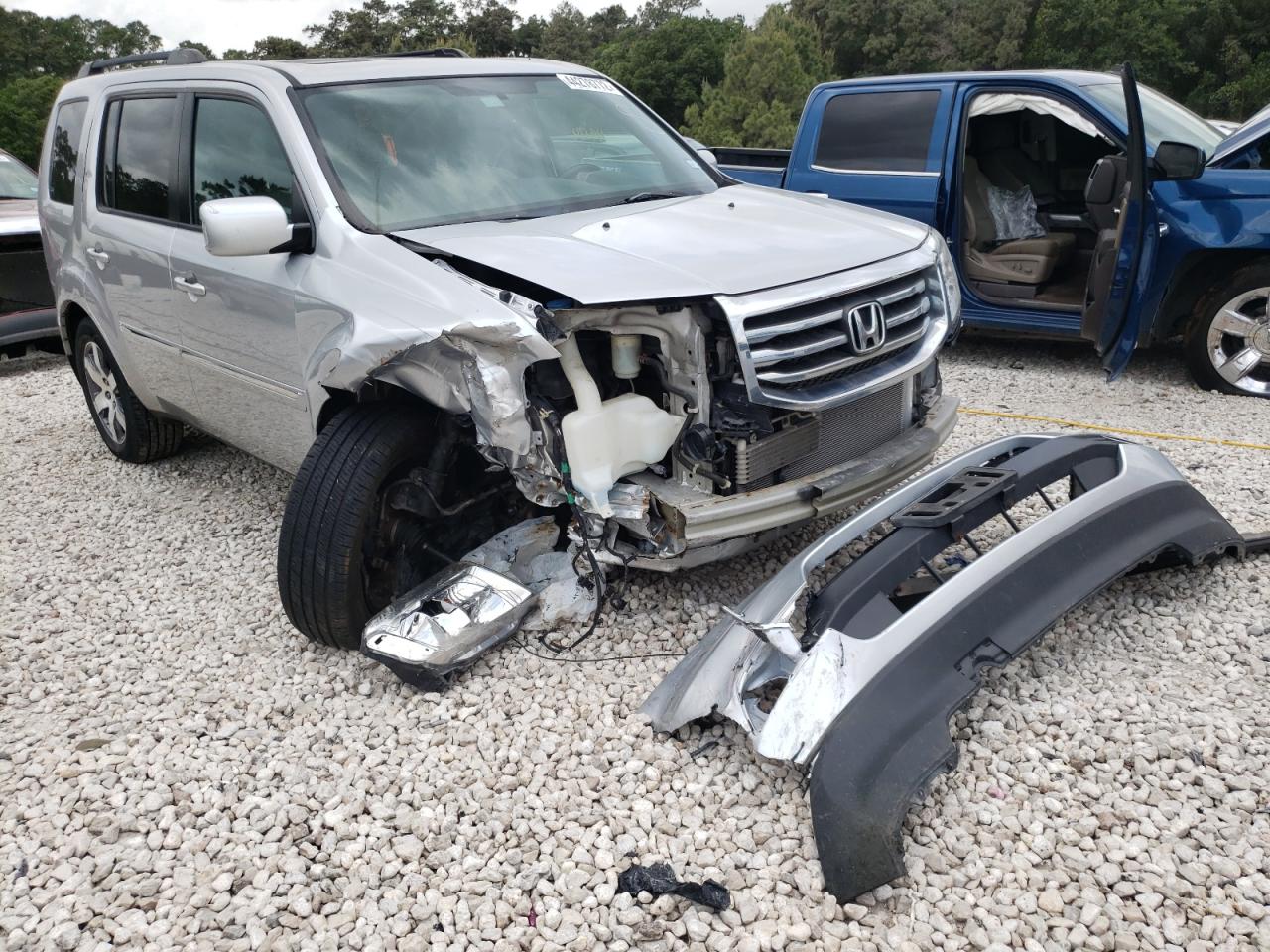 HONDA PILOT TOUR 2013 with VIN 5FNYF4H90DB073842 - Photo from auction