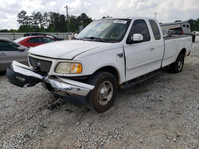 Photo 2 from auction – 2000 FORD F150 with VIN 1FTRX18L6YKB23082