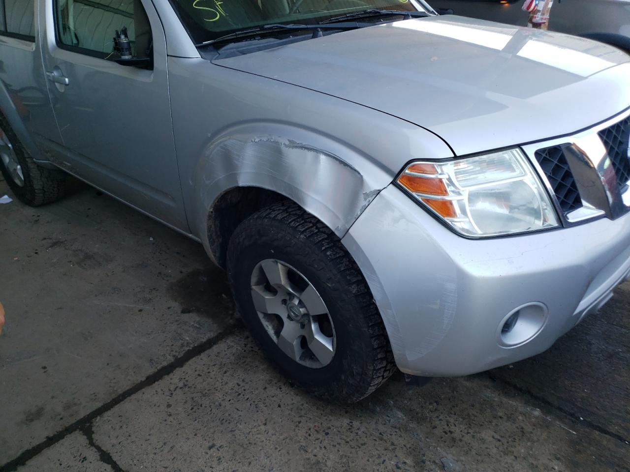Photo 9 from auction – 2012 NISSAN PATHFINDER with VIN 5N1AR1NB9CC636859