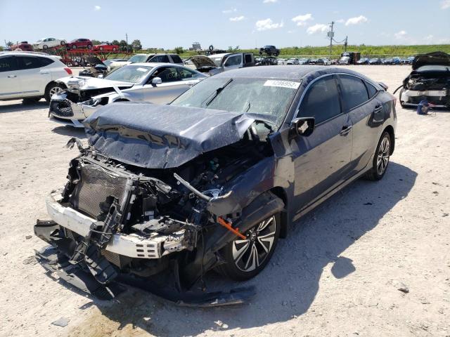 Photo 2 from auction – 2017 HONDA CIVIC EXL with VIN 2HGFC1F7XHH637658