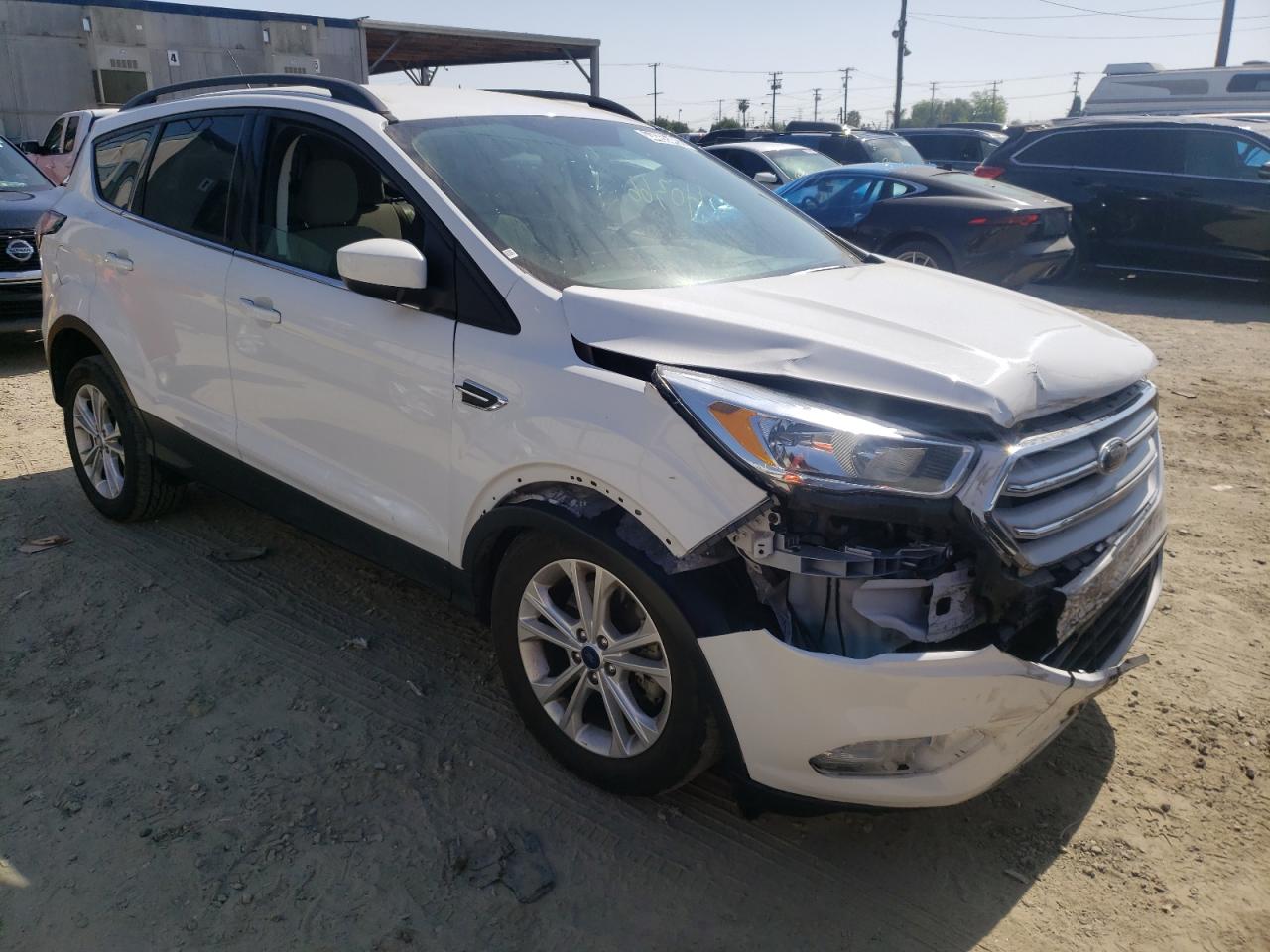 FORD ESCAPE SE 2018 with VIN 1FMCU9GD2JUB74155 - Photo from auction