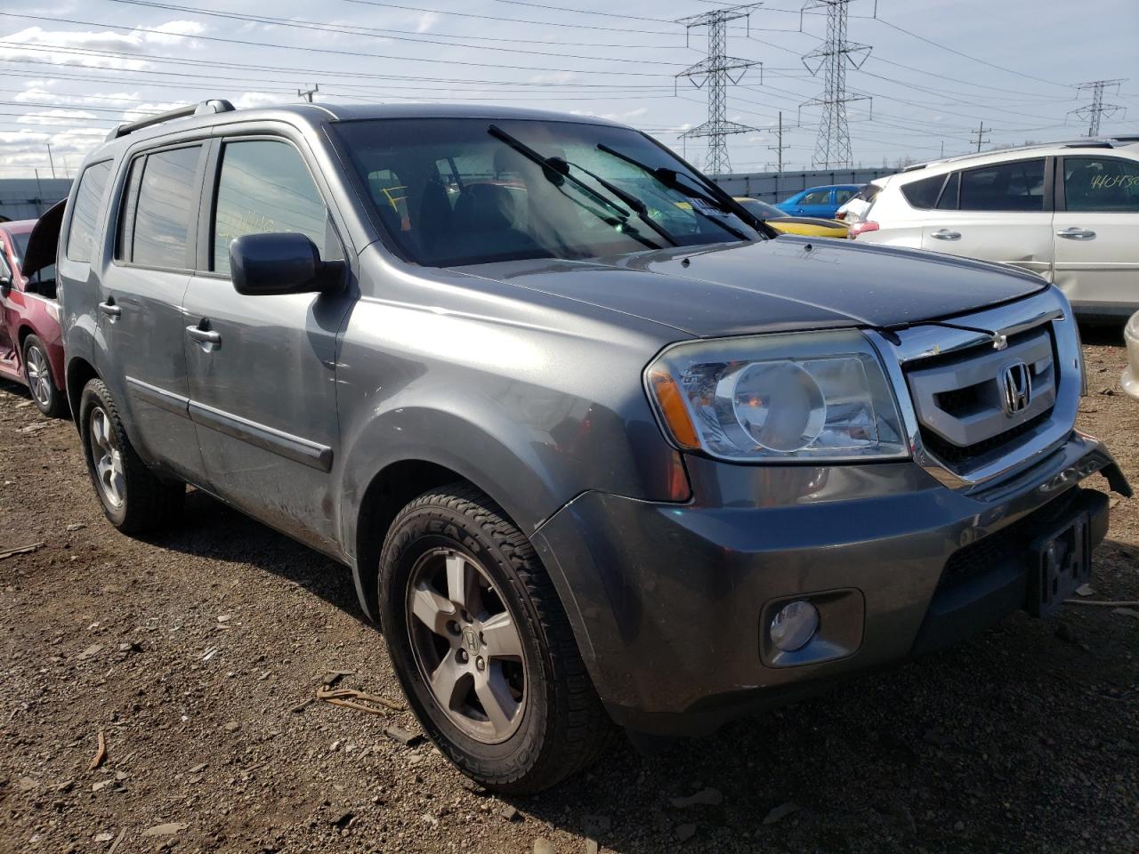 HONDA PILOT EXL 2011 with VIN 5FNYF4H59BB005808 - Photo from auction